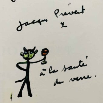 Jacques Prévert dédicace une plaquette d'exposition avec un amusant petit dessin