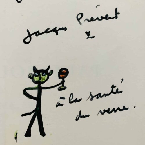 Jacques Prévert dédicace une plaquette d'exposition avec un amusant petit dessin